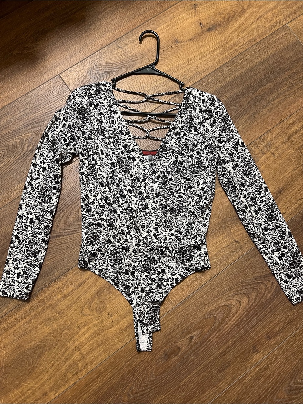 Black & White Floral Long Sleeve Bodysuit with Crisscross back